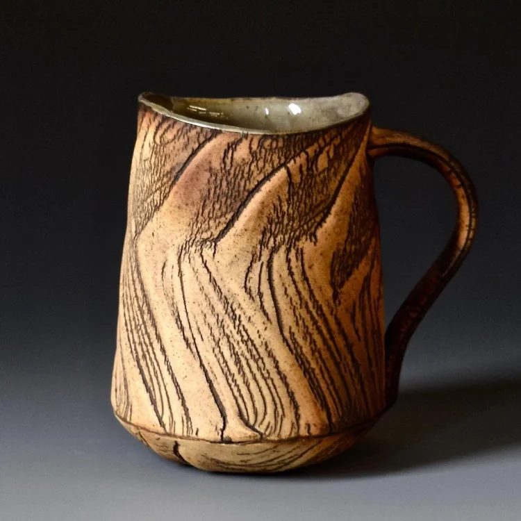 A kohiki mug by Akira Satake