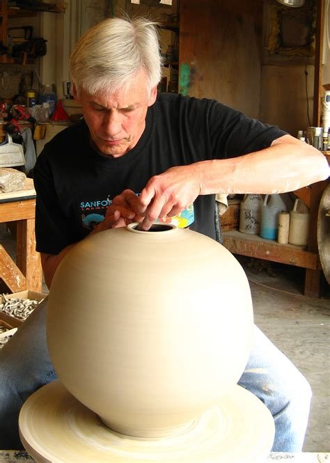 Steven Forbes-deSoule throwing a large round form on the wheel