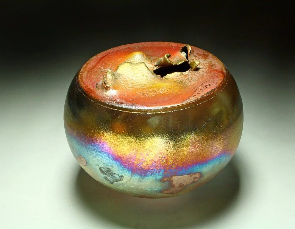 A gold luster raku vessel by Steven Forbes-deSoule
