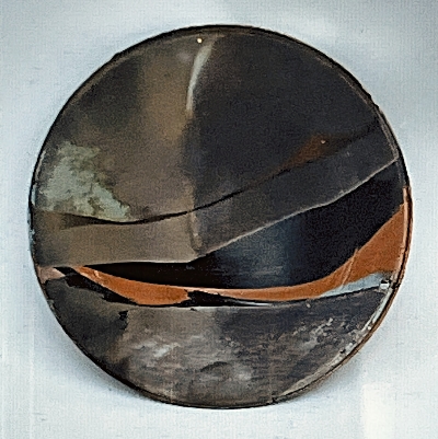 Raku platter on terracotta clay